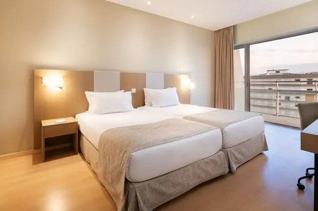 Standard Tek Büyük veya İki Ayrı Yataklı Oda (With Free Parking)