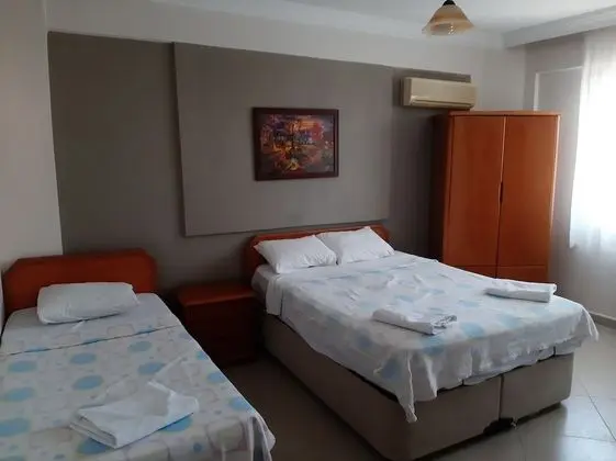 Üç Kişilik Oda