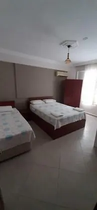 Üç Kişilik Oda