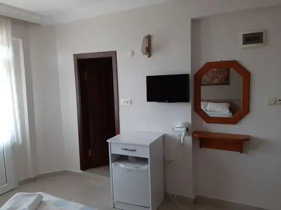 Üç Kişilik Oda