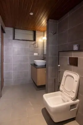 Deluxe Tek Büyük veya İki Ayrı Yataklı Oda, 1 Yatak Odası, Özel Banyo, Bahçe Manzaralı