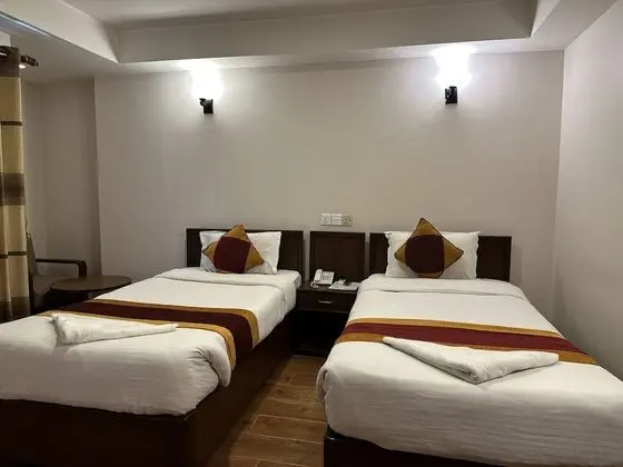 Deluxe Tek Büyük veya İki Ayrı Yataklı Oda