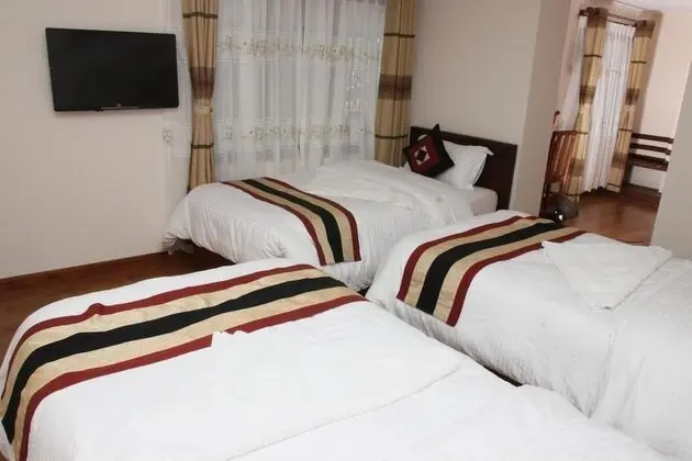 Deluxe Üç Kişilik Oda