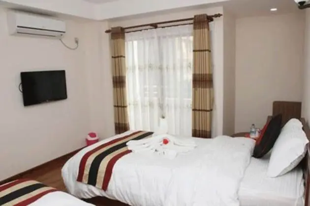 Deluxe Üç Kişilik Oda
