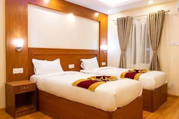 Deluxe Tek Büyük veya İki Ayrı Yataklı Oda