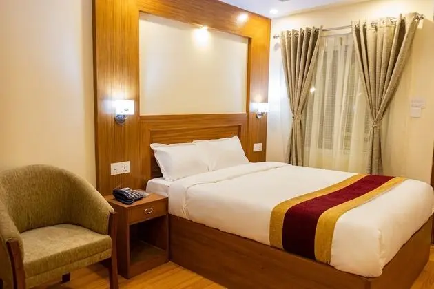 Deluxe Tek Büyük veya İki Ayrı Yataklı Oda