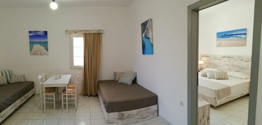 Junior Suite (Quadruple) Bedroom & Living Room