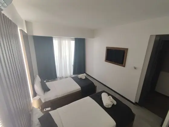 Deluxe Tek Büyük veya İki Ayrı Yataklı Oda