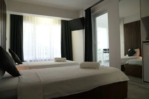 Deluxe Tek Büyük veya İki Ayrı Yataklı Oda