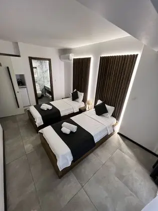 Deluxe Tek Büyük veya İki Ayrı Yataklı Oda