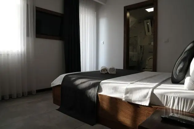 Deluxe Tek Büyük veya İki Ayrı Yataklı Oda