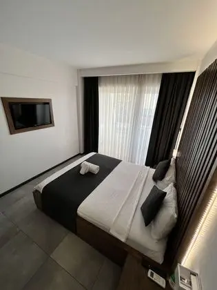 Deluxe Tek Büyük veya İki Ayrı Yataklı Oda