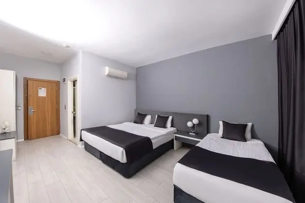 Deluxe Üç Kişilik Oda