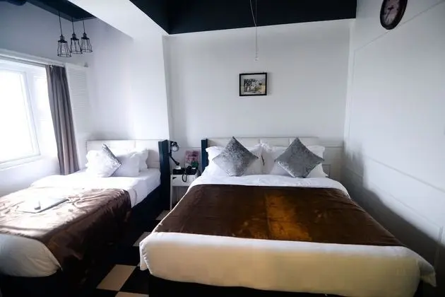 Deluxe Üç Kişilik Oda