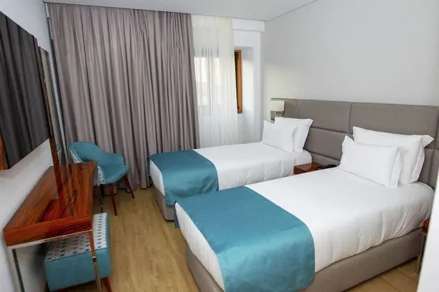 Deluxe Tek Büyük veya İki Ayrı Yataklı Oda