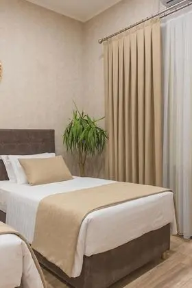 Design Tek Büyük veya İki Ayrı Yataklı Oda