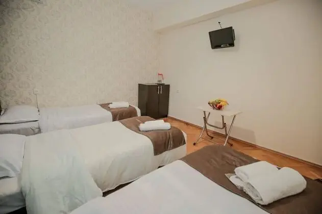 Deluxe Üç Kişilik Oda