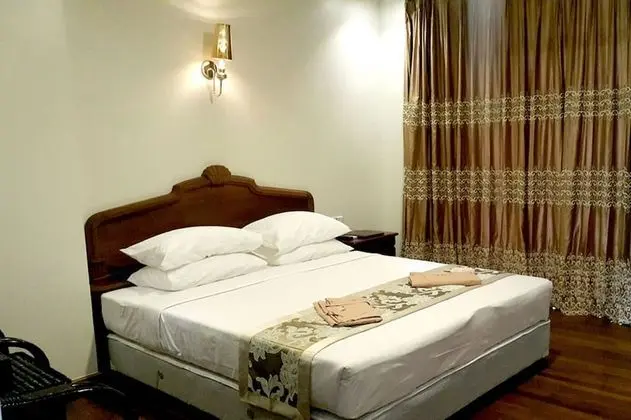 Deluxe Tek Büyük veya İki Ayrı Yataklı Oda