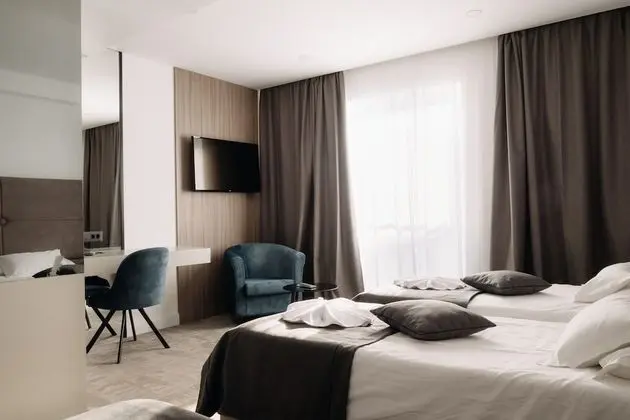 Deluxe Üç Kişilik Oda, Kısmi Deniz Manzaralı