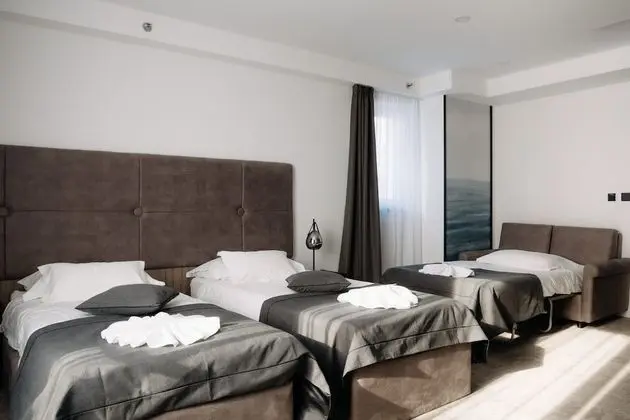 Deluxe Üç Kişilik Oda, Kısmi Deniz Manzaralı