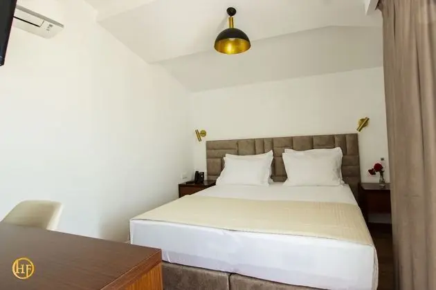 Economy Tek Büyük veya İki Ayrı Yataklı Oda