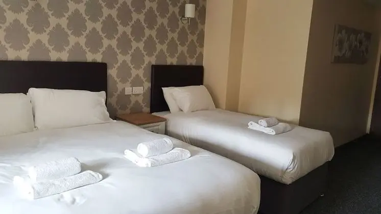 Deluxe Üç Kişilik Oda, Birden Çok Yatak