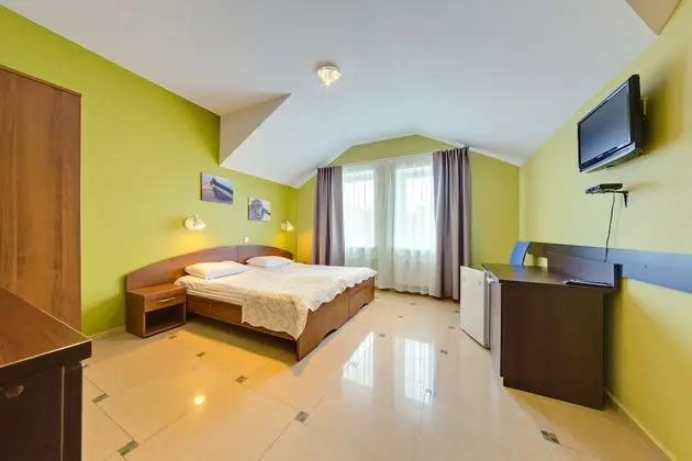 Standard Tek Büyük veya İki Ayrı Yataklı Oda, Bahçe Manzaralı