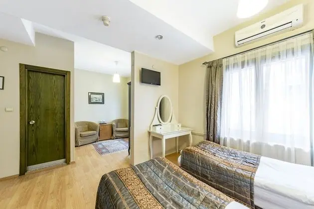 Üç Kişilik Oda