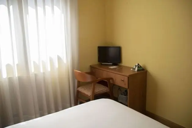 Economy Tek Büyük veya İki Ayrı Yataklı Oda