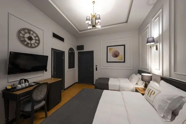 Deluxe Üç Kişilik Oda