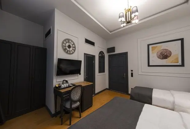 Deluxe Üç Kişilik Oda