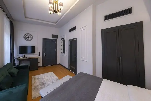 Deluxe Üç Kişilik Oda