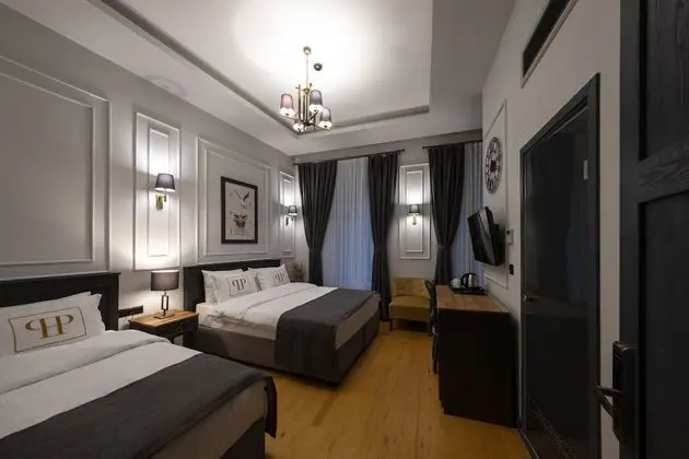 Deluxe Üç Kişilik Oda