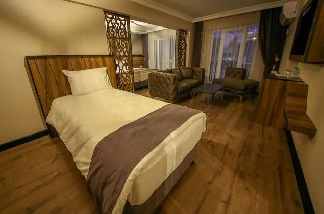 Deluxe Üç Kişilik Oda