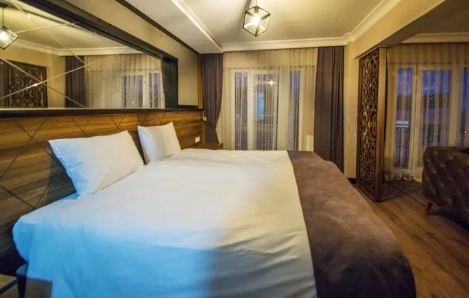 Deluxe Üç Kişilik Oda