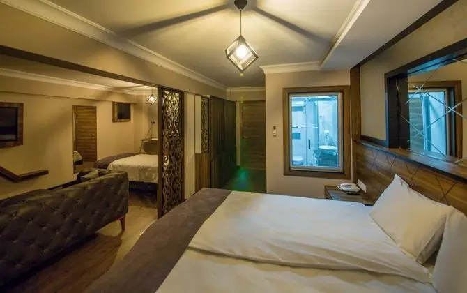 Deluxe Üç Kişilik Oda