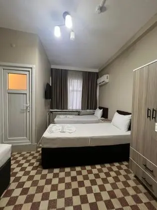 Üç Kişilik Oda