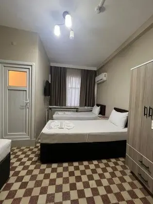 Üç Kişilik Oda