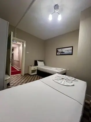Üç Kişilik Oda