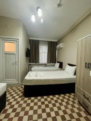 Üç Kişilik Oda