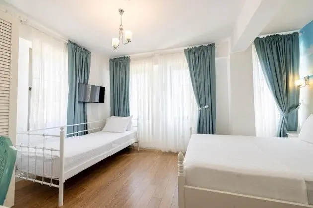 Standart Üç Kişilik Oda, Bahçe Manzaralı
