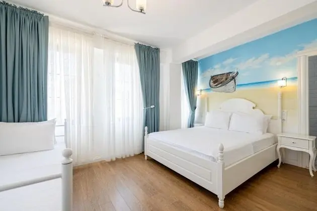 Standart Üç Kişilik Oda, Bahçe Manzaralı
