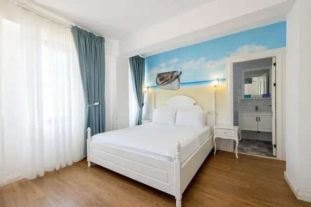 Standart Üç Kişilik Oda, Bahçe Manzaralı