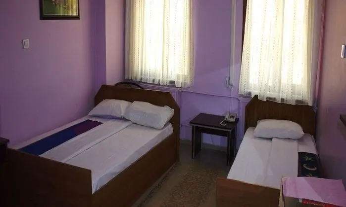 Üç Kişilik Oda