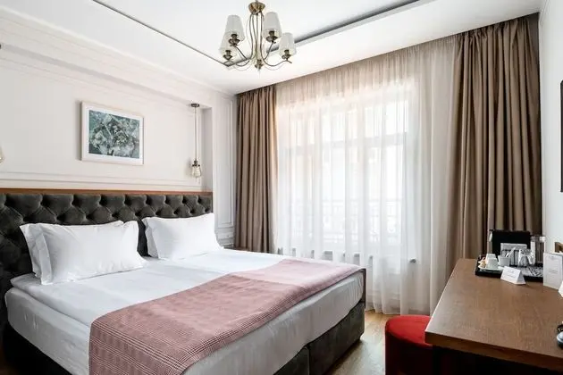 Deluxe Tek Büyük veya İki Ayrı Yataklı Oda