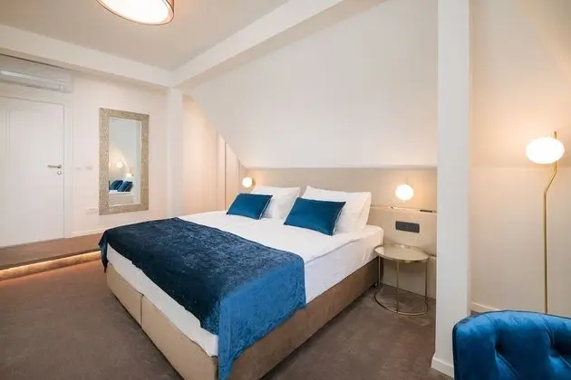 Deluxe Tek Büyük veya İki Ayrı Yataklı Oda