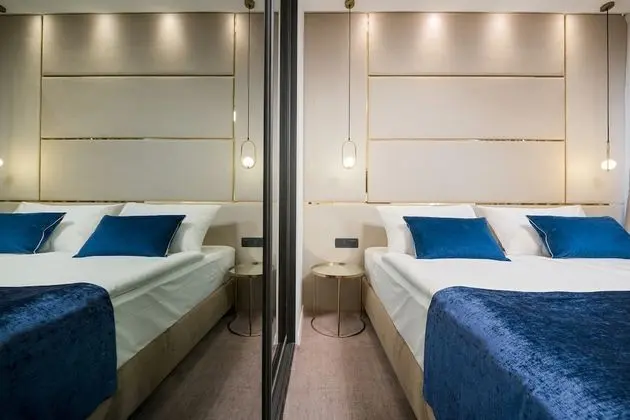 Deluxe Tek Büyük veya İki Ayrı Yataklı Oda