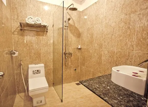 Deluxe Üç Kişilik Oda, Bahçe Manzaralı