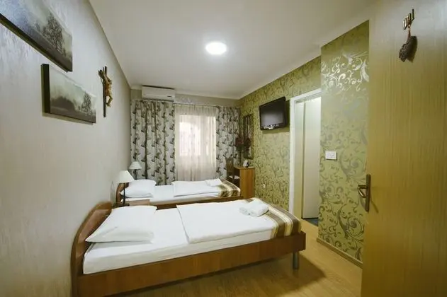 Comfort Tek Büyük veya İki Ayrı Yataklı Oda