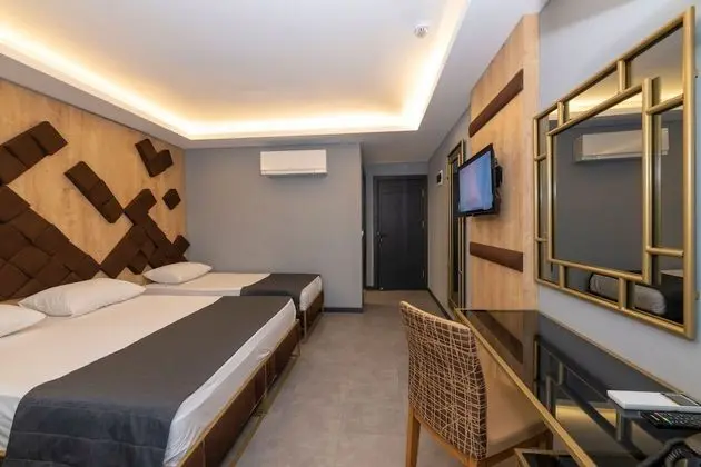 Deluxe Tek Büyük veya İki Ayrı Yataklı Oda